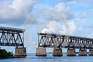 The old Florida East Coast Railway Pratt Truss bridge spanning b