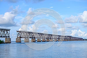 The old Florida East Coast Railway Pratt Truss bridge spanning b photo