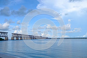 The old Florida East Coast Railway Pratt Truss bridge spanning b photo