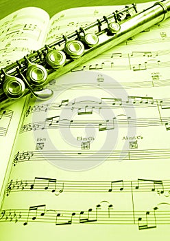 Old flute and music score photo