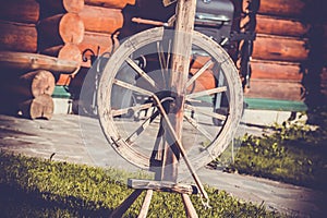 Old  folk wooden vintage peasant spinning wheel