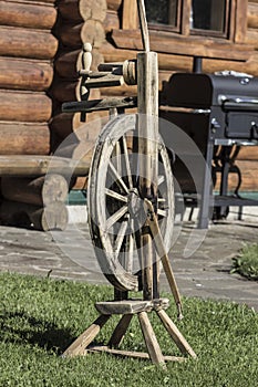 Old  folk wooden vintage peasant spinning wheel