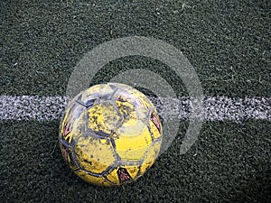 The old football on artificial turf