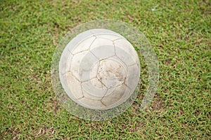 old football on grass