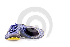 Old football shoes damaged on white background futsal sportware object isolated