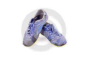 Old football shoes damaged on white background futsal sportware object isolated