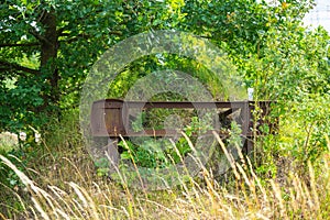 An old forgotten train carriage on a disused railway