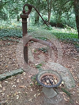 Old fount in a garden photo