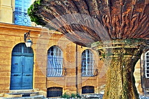 Old fountain in Aix-en-Provence, France photo