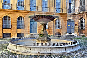 Old fountain in Aix-en-Provence, France photo