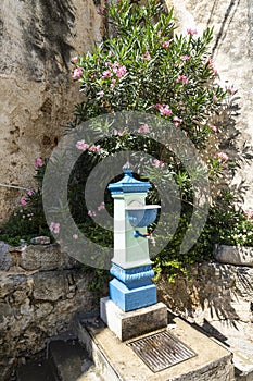 the old fountain in the center of Moscenice, Croatia