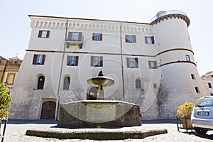 Old fountain and house from San Rocco square photo