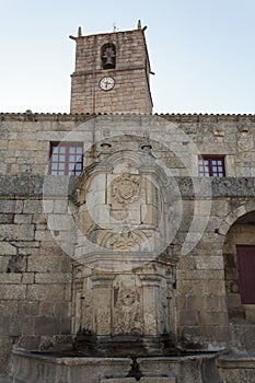 Old fountain in Town hall square in historic portuguese village of Castelo Novo in Fundao