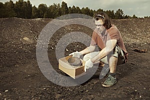 An old fragment of Akkad cuneiform found on terrain excavations photo