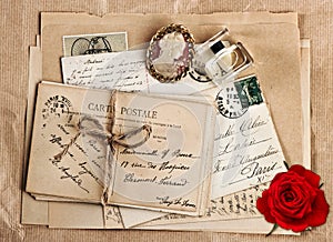 Old french post cards and rose flower