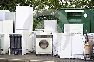 Old fridges freezers wash machines and kitchen appliances at rubbish dump