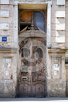 The old front door of an apartment building.