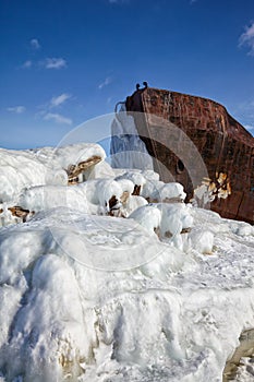 Old frozen ship on the bank of Olkhon island on siberian lake