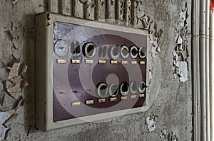 Old fuse box in an abandoned hall