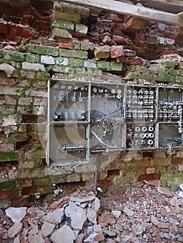 Old Fuse boxes and a brick wall