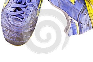 Old futsal shoes on white background football sportware object isolated