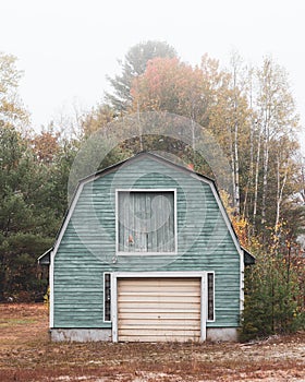 An old garage with autumn color in Hanover, Maine