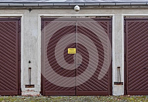 Old garage door in a building with the sign `parken verboten`