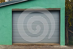 Old garage with new shutter door