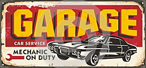 Old garage sign with classic car graphic