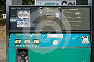An old gas pump at an abandoned gas station in Lowell, Idaho, USA - July 26, 2021