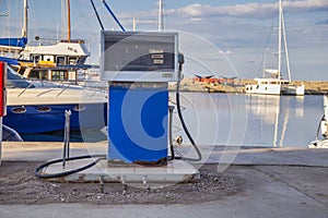 Old gas station for boats and ships at the port
