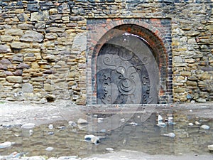 Old gate around the Saxon Tower and church in central area Media