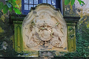 Old gate of the Galle Fort, Sri Lanka, with the British Coat of Arms and motto `Dieu Et Mon Droit` clearly visible.