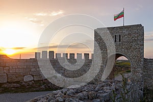 Old gate guarding the entrance of the medieval fortress in Kaliakra  Cape, Bulgaria, on a sunny spring day at sunset
