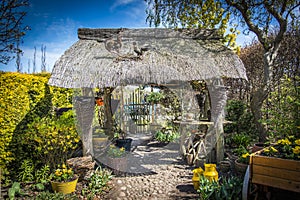 Old gazebo with thatched roof