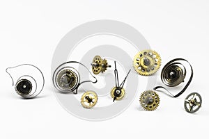 Old gears and springs from watches isolated on a white background