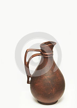 Old jug isolated on white background