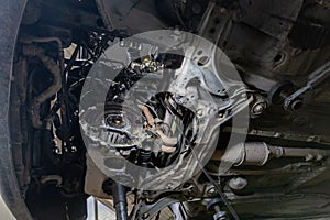 old German car engine bay with dismounted gearbox, view from below