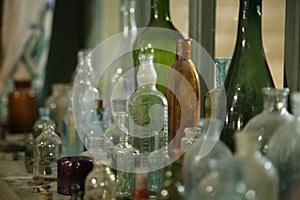Old glass bottles and bottles close-up.