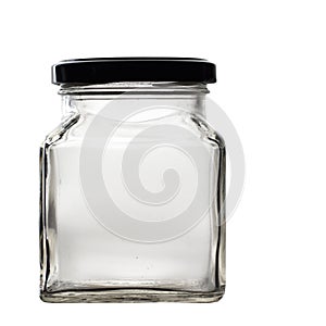 Old glass jar with lid isolated on black. Empty.