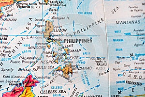 An old globe map showing the country of Philippines.