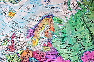 An old globe map showing Sweden and Finland.