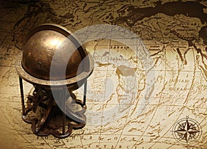 Old globe on map of the world