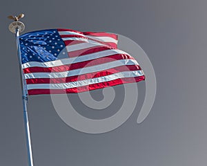 Old Glory Gently Wafting in the Breeze on a Gray Day