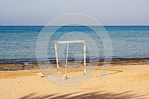 Old goalpost in a tropical beach abandoned