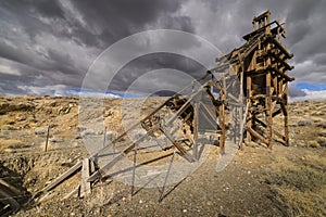 Old gold mining sluice life head frame photo