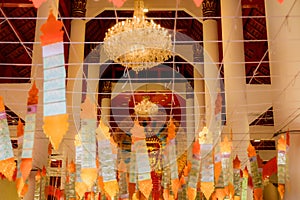 Old golden Buddha statue in the chapel at Wat Phra Singh in Chiang Mai Province