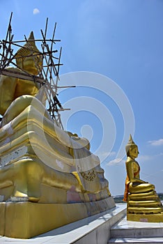 Old golden buddhist temple in Bangkok, Thailand.shrine inside of a buddhist temple.