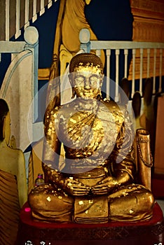 Old golden buddhist temple in Bangkok, Thailand.shrine inside of a buddhist temple.