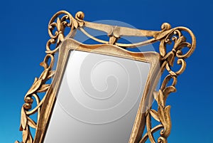 Old golden frame of a mirror